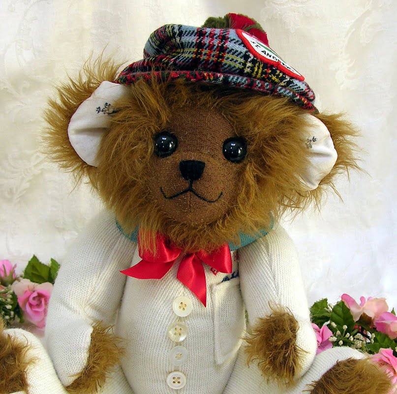 Memory bear made from long mohair plush with cap.