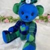 Blue with green memory bear made from loved one's shirts.