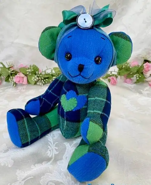 Blue with green memory teddy bear made from loved one's shirts.