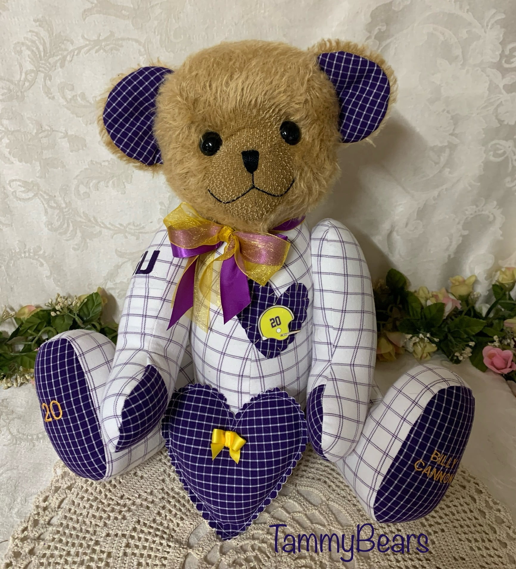 Mohair plush bear made from purplew and white clothing.