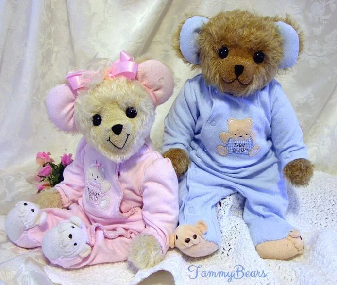 Pink and blue memorial teddy bears made from baby clothing.