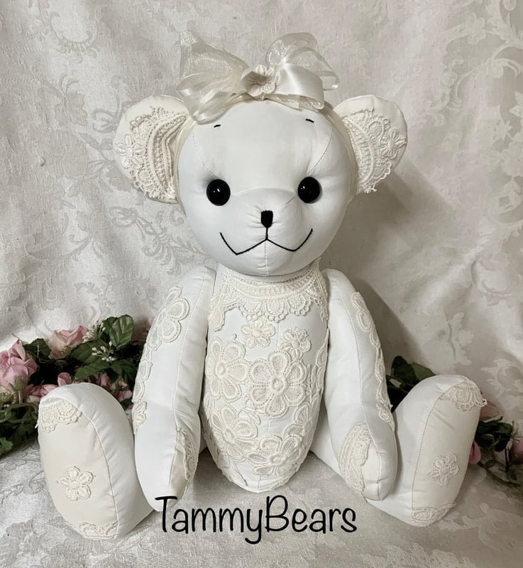 White teddy ber made from wedding dress.