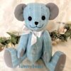 Memorial teddy bear crafted from a light blue shirt.