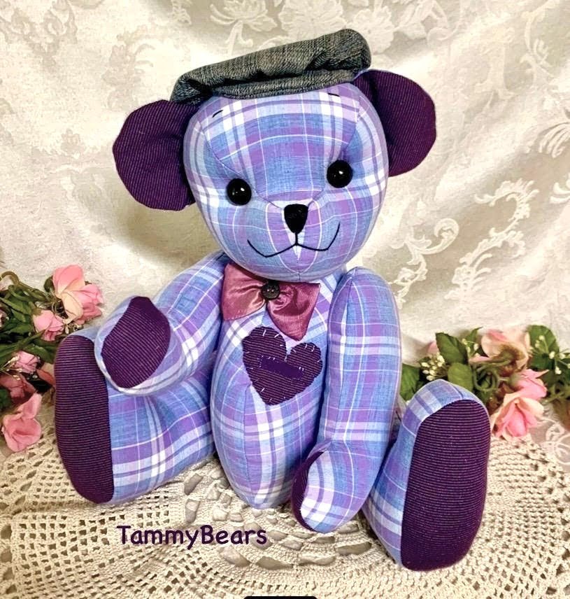 Memorial bear made from purple plaid shirt. 