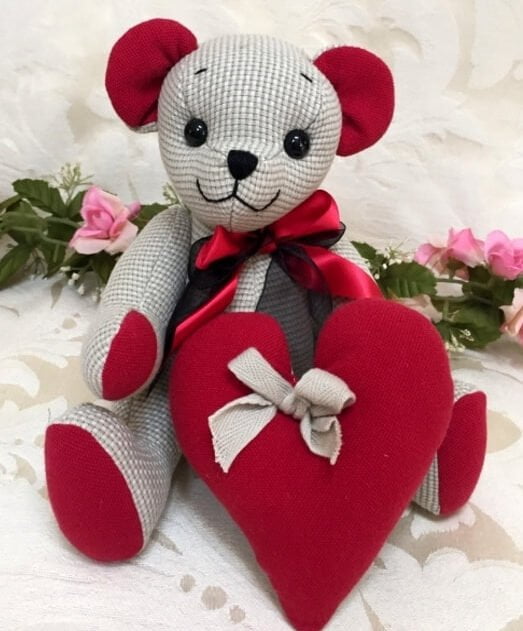 Memory bear made from tan pants with red heart.