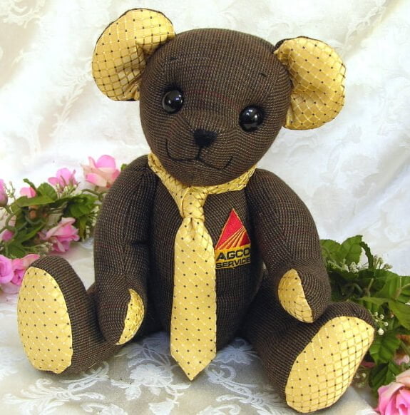 Sweet bear made from brown jacket and yellow tie.