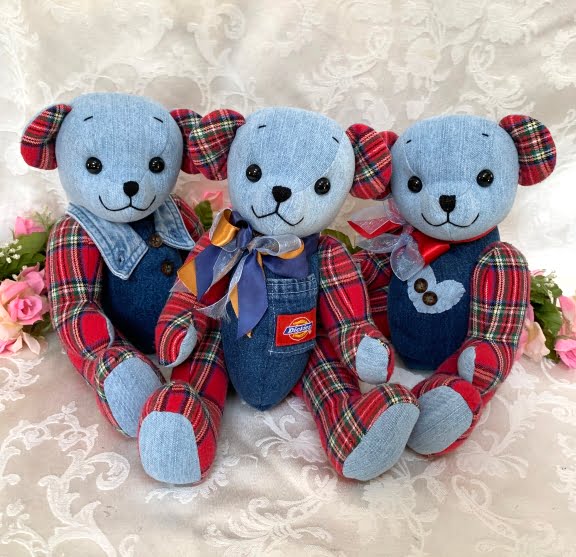 Three memory bears made from shirts and overalls.